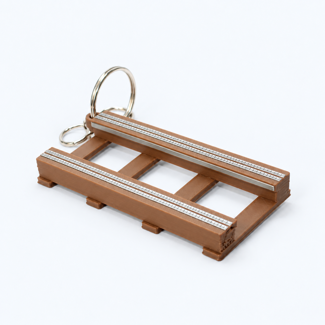 The Woodie: brown coaster track keyring with silver rails